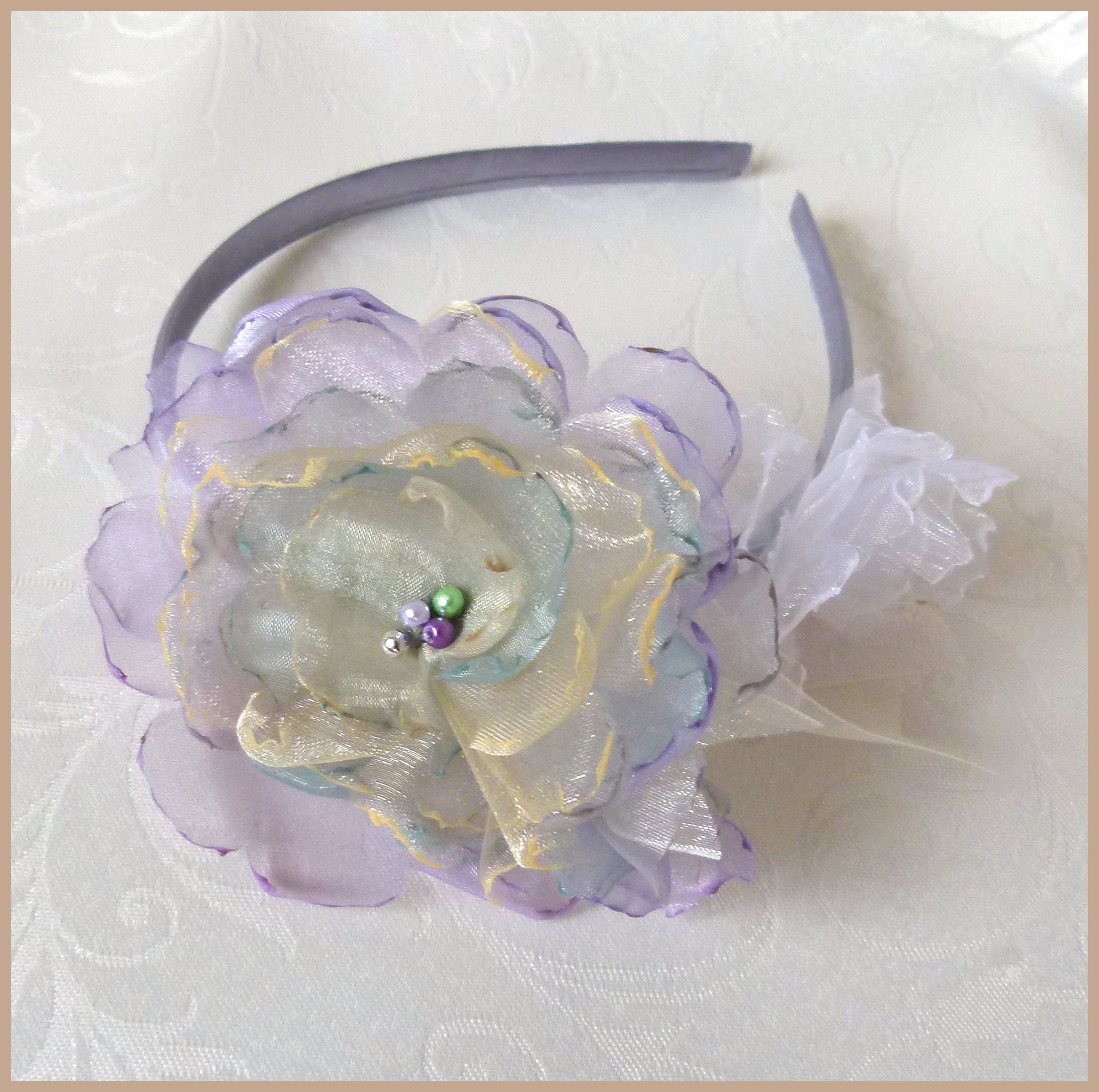Grey Satin-Covered Alice Band with White and Mauve/Cream/Green Beaded Organza Flowers