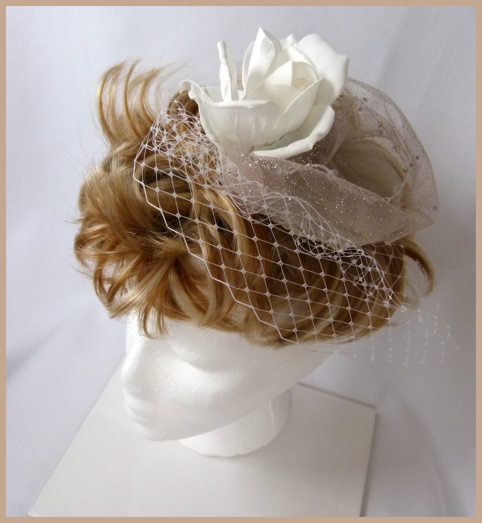Bridal Fascinator with white rose, ivory sparkle trim and ivory veiling