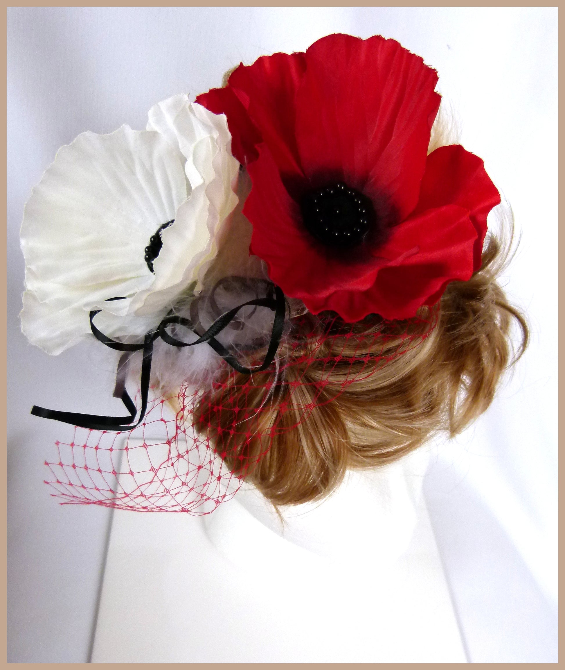 Poppies Fascinator with red and white poppies, white marabou feathers, black ribbon and red veiling